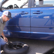 Image for article titled The Dodge Grand Caravan Had A Really Weird Spare Tire Placement